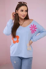 Sweater blouse with blue floral pattern