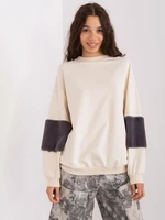 Light beige sweatshirt with fur on the sleeves