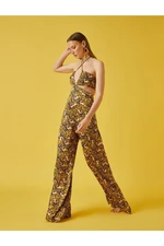 Koton Halterneck Patterned Jumpsuit with Window Detail