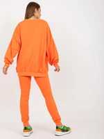 Orange tracksuit with patches