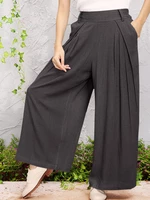 Wide-legged Elastic Waist Solid Color Pants With Side Pockets