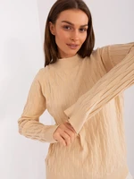 Beige women's classic sweater with patterns