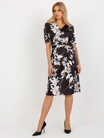 Black and white floral cocktail dress with tie