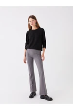 LC Waikiki Women's Extra Tight Fit, Straight Flared Leg Women's Trousers.