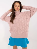 Light pink women's oversized turtleneck sweater