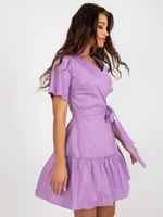 Light purple flowing dress with frills