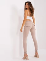 Beige women's sweatpants with application