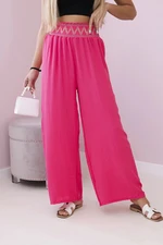 Trousers with a wide elastic waistband in pink color