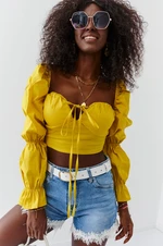 Short mustard blouse with long sleeves