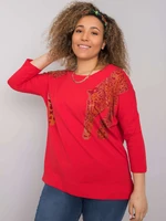 Red blouse with rhinestones