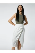 Koton Midi Skirt with Wrapover Closure and Deep Slits.