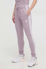 Bavlněné tepláky adidas fialová barva, IR5379