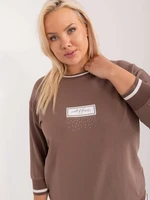 Brown blouse in a larger size with a print