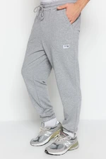 Trendyol Men's Gray Melange Regular Fit Sweatpants with Labels, Appliques, Stitched Pockets.