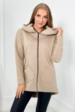 Insulated sweatshirt with a longer back and pockets light beige