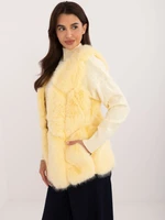 Light yellow vest with fur