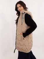 Beige long quilted vest with zipper