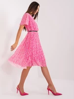 Pink-white flowing dress with polka dots