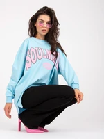 Light blue and pink sweatshirt with a colourful print