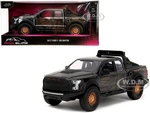 2017 Ford F-150 Raptor Pickup Truck Black with Gold Graphics "Pink Slips" Series 1/24 Diecast Model Car by Jada