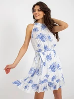 White linen floral dress with a belt