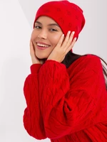 Red winter hat with appliqués