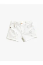 Koton Denim shorts with pockets, frayed details, cotton tassels around the edges, and an adjustable elasticated waist.