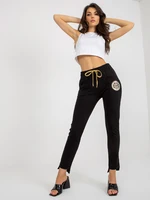 Black cotton sweatpants with application