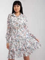 White dress with floral print and long sleeves