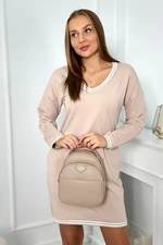 Dress with pockets and beige V-neckline