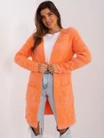 Orange women's cardigan with patterns