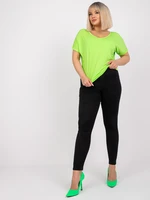 Dina's light green blouse of loose fit