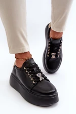 Women's leather sneakers on a black Vinceza platform