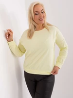 Light yellow plus size blouse with a round neckline