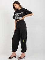 Black two-piece tracksuit with cargo trousers