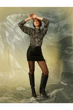 Koton Leather Look Mini Skirt with Tie Side Detail.