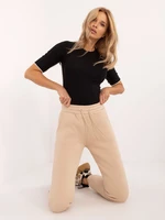 Beige insulated sweatpants with pockets