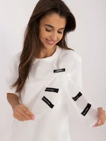 Ecru formal blouse with bow and inscriptions