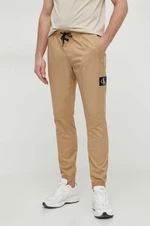 Kalhoty Calvin Klein Jeans pánské, béžová barva, přiléhavé, J30J325114