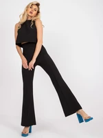 Elegant black ensemble with high-waisted trousers