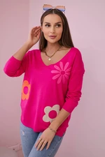 Sweater blouse with fuchsia floral pattern