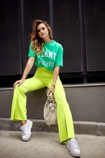 Lady's elegant trousers with slit neon lime