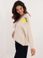 Light beige women's sweater with buttons