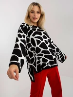 Black and white patterned oversize sweater