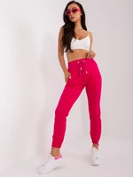 Fuchsia women's sweatpants with inscriptions