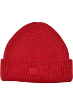 Knitted woolen hat with a large volume