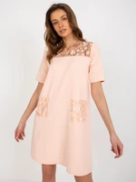 Peach mini cocktail dress with pockets