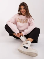 Light pink hoodie with inscription