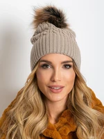 Beige hat with fur pompom