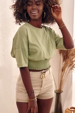 Short blouse with wide khaki ribbing